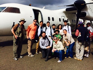 The group boarding a plane to go on a safari 